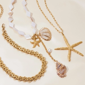 Titanium steel shell and pearl necklace set with starfish charms in gold finish