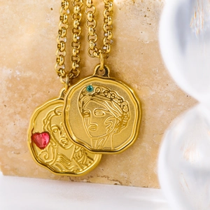 Gold coin pendant necklace set with vintage embossed portraits and colorful gemstones