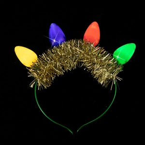 Close-up of glowing LED Christmas headband with colorful bulbs and gold tinsel details