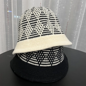 Women's jacquard knit bucket hats in black and beige with vintage floral patterns