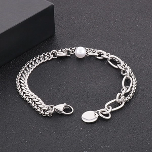 Minimalist stainless steel double layer bracelet with white pearl on black background