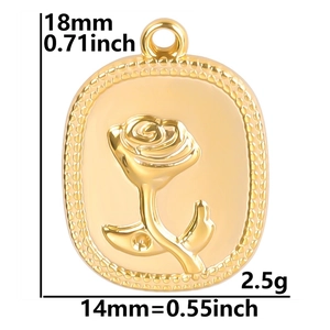Detail view of a gold oval rose relief pendant with size 18x14mm and weight 2.5g markings