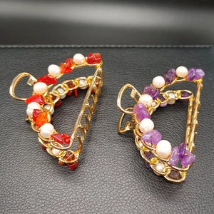 Golden hair claws set with natural purple amethyst, red stones and white pearls