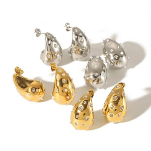 Chunky water drop earrings in 18k gold and silver with sparkling inlaid crystals