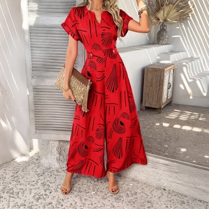 Women's V-neck short sleeve wide leg jumpsuit in red with black abstract print