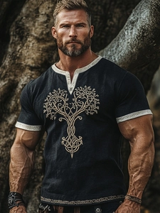 Detail of gold Celtic Tree of Life print on men's vintage short sleeve v-neck black tee
