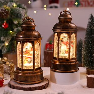 Macro shot of retro bronze Christmas lantern with Santa and snowman scene inside