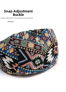 Detail of adjustable metal buckle on a retro ethnic jacquard woven beret cap