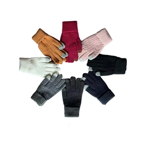 Detail showing various colors of knitted touch screen gloves arranged in radial pattern