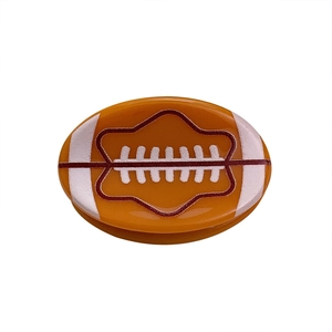 Polierter Handy-Grip in American-Football-Form mit orangefarbenem Finish und weißen Nähten