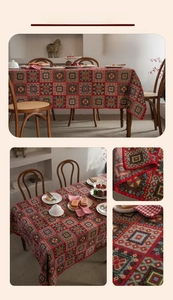 Detail of red geometric square embroidery on retro tablecloth with pom pom fringe trim
