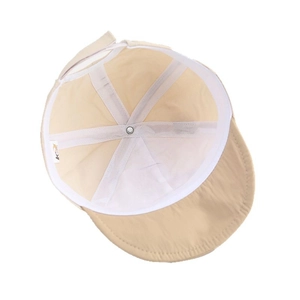 Inside view of beige breathable baby sun hat with sweatband and soft structure