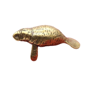 Antique brass manatee figurine decorative sea lion ornament with vintage metal finish