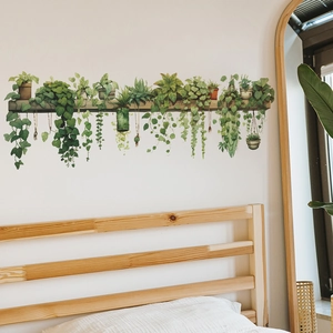 Green hanging plant wall stickers on wooden shelf for cozy bedroom home decoration