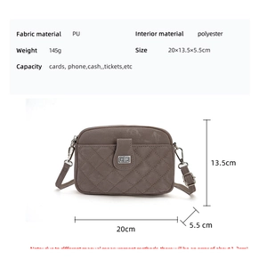 Detail view of the taupe quilted crossbody bag showing size dimensions and PU leather texture