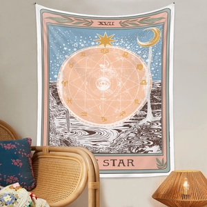 Detail of The Star Tarot tapestry with zodiac symbols in a bohemian home setting
