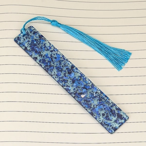 Sparkling blue handmade resin bookmark with aesthetic glitter and matching silk tassel