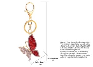 Detailed size specifications for the gold butterfly keychain with red enamel and crystals