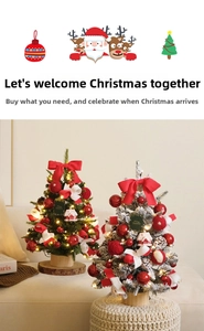 Mini tabletop Christmas trees with warm LED lights, red bows, and white flocked pine needles
