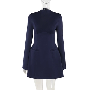 Front view of dark blue long-sleeve dress with mock neck and decorative pocket details