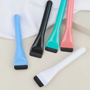 Flat top foundation brushes in various colors for smooth makeup and mask application