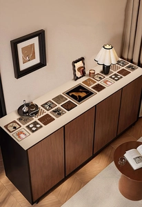 Detailed retro pattern leather mats with leopard and floral prints on a stylish sideboard