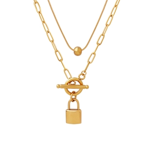 Double-layer gold titanium steel necklace featuring OT clasp with padlock and ball pendants