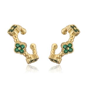 Luxurious gold clover ear cuff featuring vibrant green rhinestones in a C-shaped design