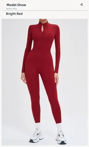 Front detail of red thermal yoga bodysuit with stand collar and zipper closure