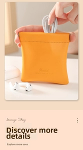 Detail of yellow leather storage pouch with squeeze closure for cables and earphones