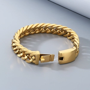 Macro view of gold curb chain link structure with secure lobster clasp for men