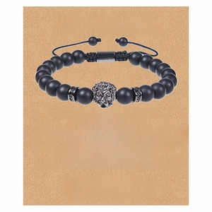 Men's matte black stone bracelet with lion head charm on sentimental gift card