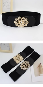 Detail of black elastic waist belt with sparkling rhinestone gold flower buckles