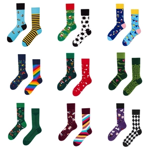 Nine pairs of creative cartoon cotton crew socks with diverse patterns for men and women