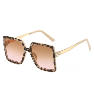 Lunettes de soleil carrées oversize en écaille avec branches dorées et verres dégradés