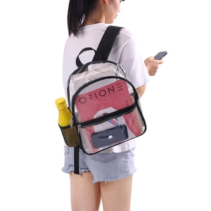 Minimalist transparent PVC backpack with black trim and side mesh pocket worn by a model