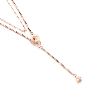 Double layered rose gold necklace featuring interlocking circles with crystals and fringe