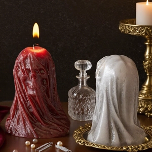 Ghost candles in red and pearl white with realistic fabric texture for Halloween decor