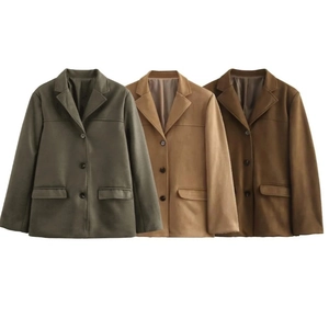 Flat lay of retro suede jackets in green, khaki, and brown with classic lapel collars