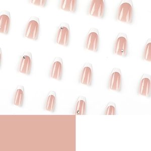 Short ballet French press-on nails in pink and white with sparkling rhinestones