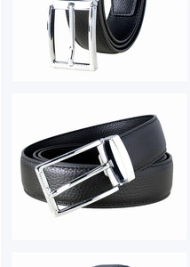 Detailed view of black litchi grain leather belt with silver rectangle pin buckle