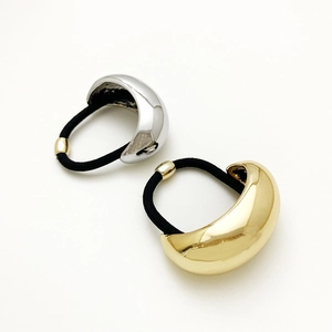 Minimalist U-shaped gold and silver metallic hair ties with high-polish finish