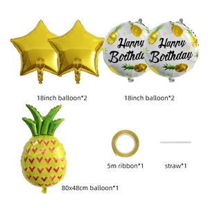 Detail of five-piece pineapple theme balloon set with gold stars and round foil balloons