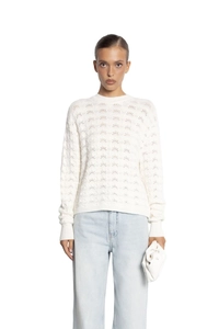 Chic cream-colored openwork knit sweater featuring long sleeves and a delicate texture