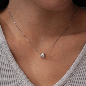 Elegant S925 sterling silver moissanite solitaire pendant necklace on a female model