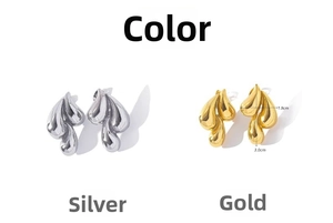 Detailed view showing gold and silver teardrop stud earrings with size measurements
