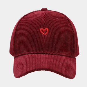 Burgundy corduroy baseball cap with red heart embroidery on the front center