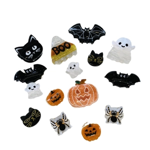 Variety set of acrylic Halloween hair clips featuring ghosts, bats, and pumpkin designs