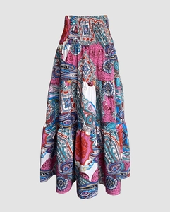 Detail of bohemian paisley print maxi skirt with elastic smocked waist and lightweight fabric