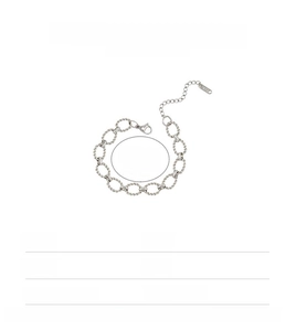 Macro detail of twisted rope chain bracelet in silver stainless steel with lobster clasp